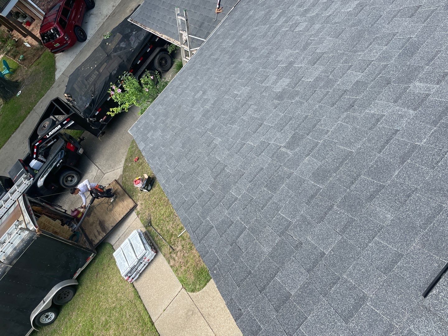 Residential Roofing Installation using Roof Replacement by American Roofing & Construction LLC