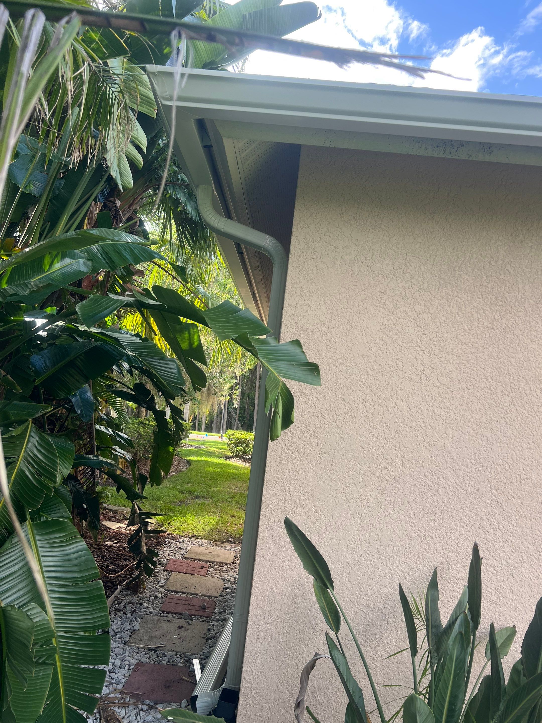 White Gutters and White Downspouts by Gutter Professors