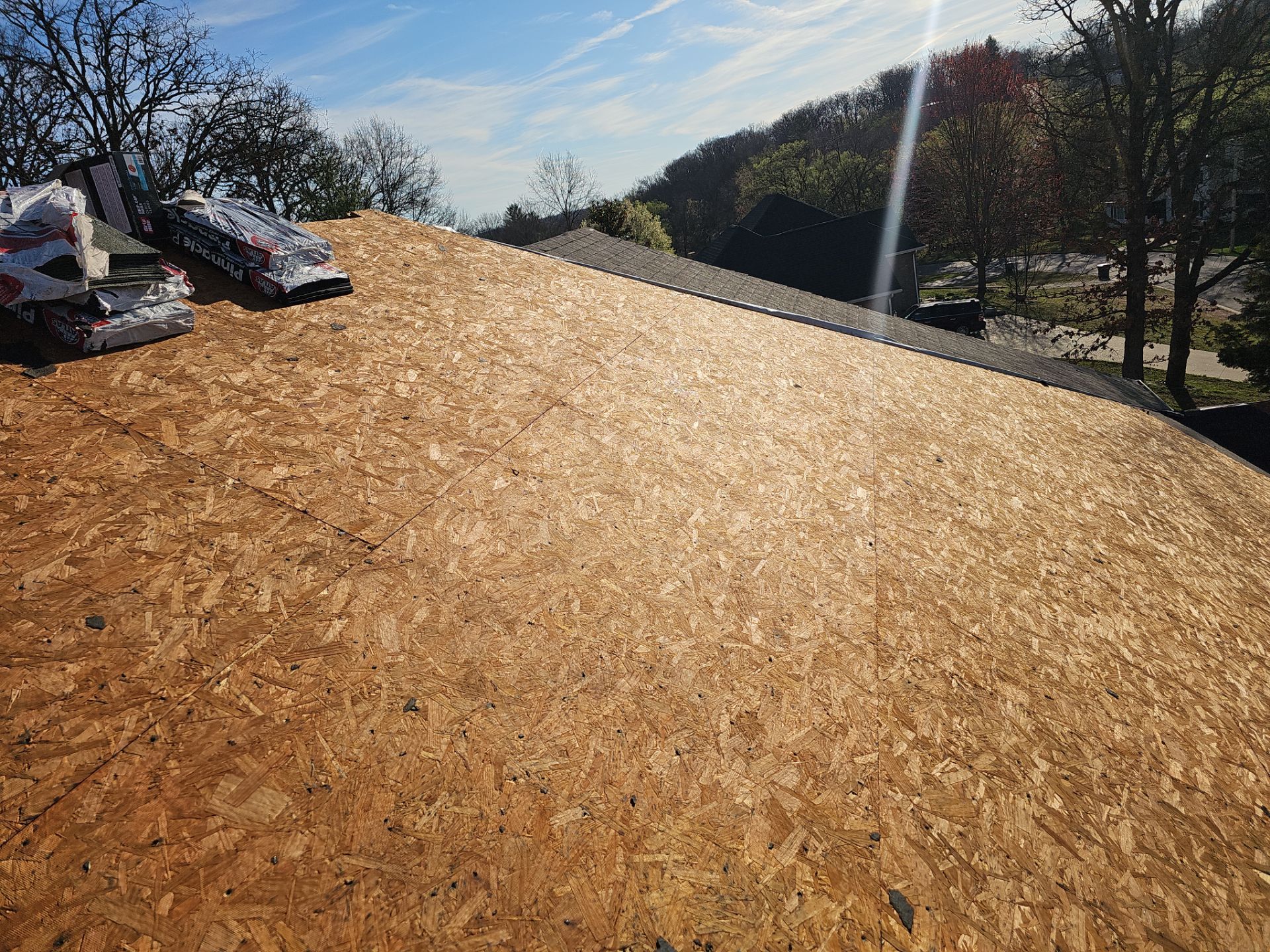 Residential Roof + Gutters & Downspouts Install  by Titan Commercial & Residential Roofing 