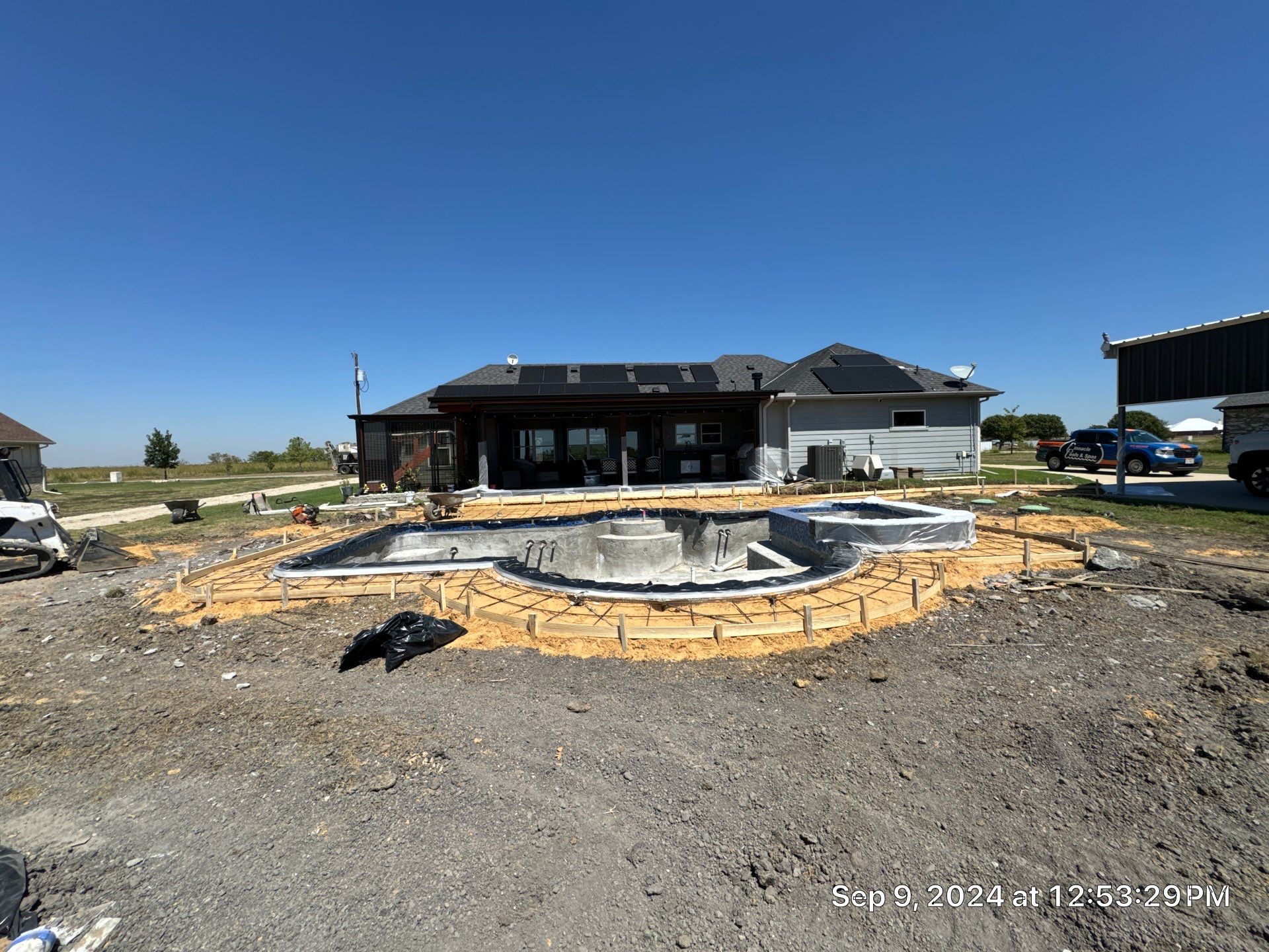Freeform Pool with Raised Spa by Pinnacle Pools and Spas - DFW