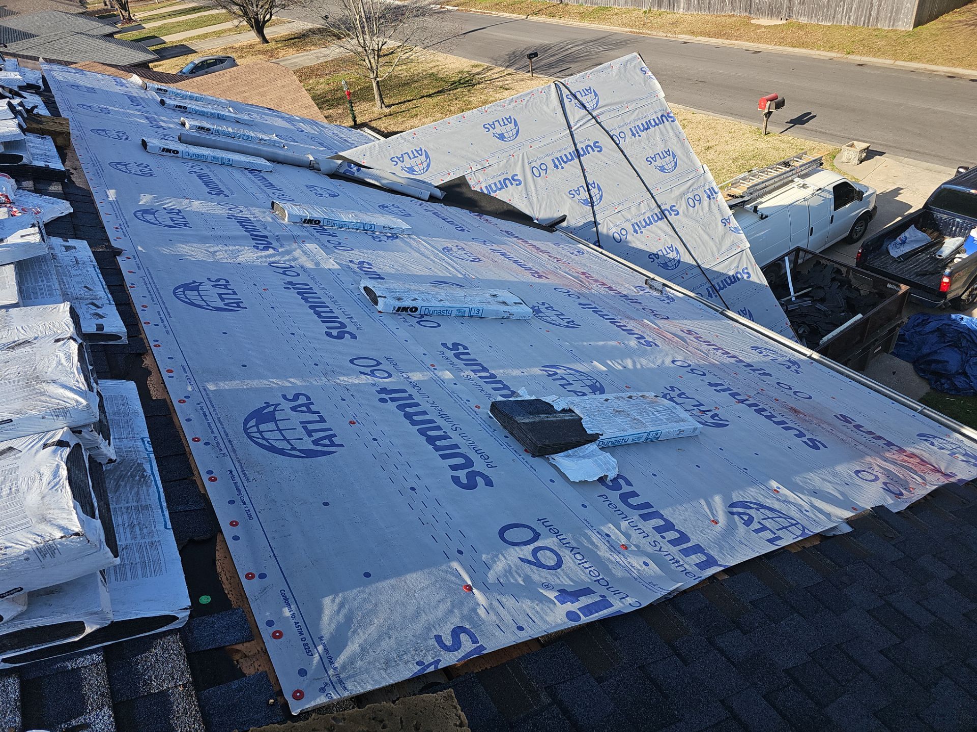 Residential Roof + Gutters & Downspouts & Gutter Guards Install  by Titan Commercial & Residential Roofing 