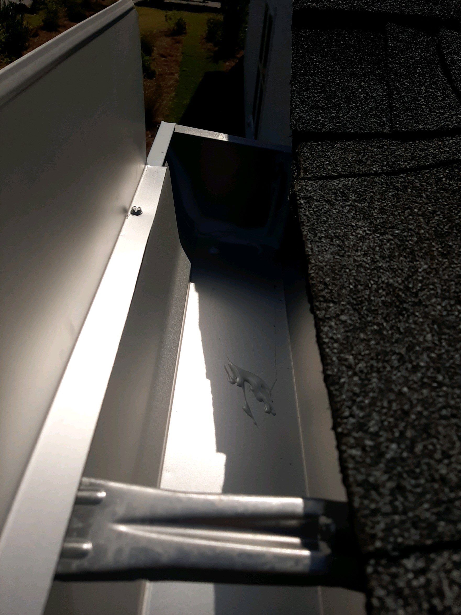 Gutter Installation Using White K-Style Aluminum Seamless Gutters by Gutter Professors