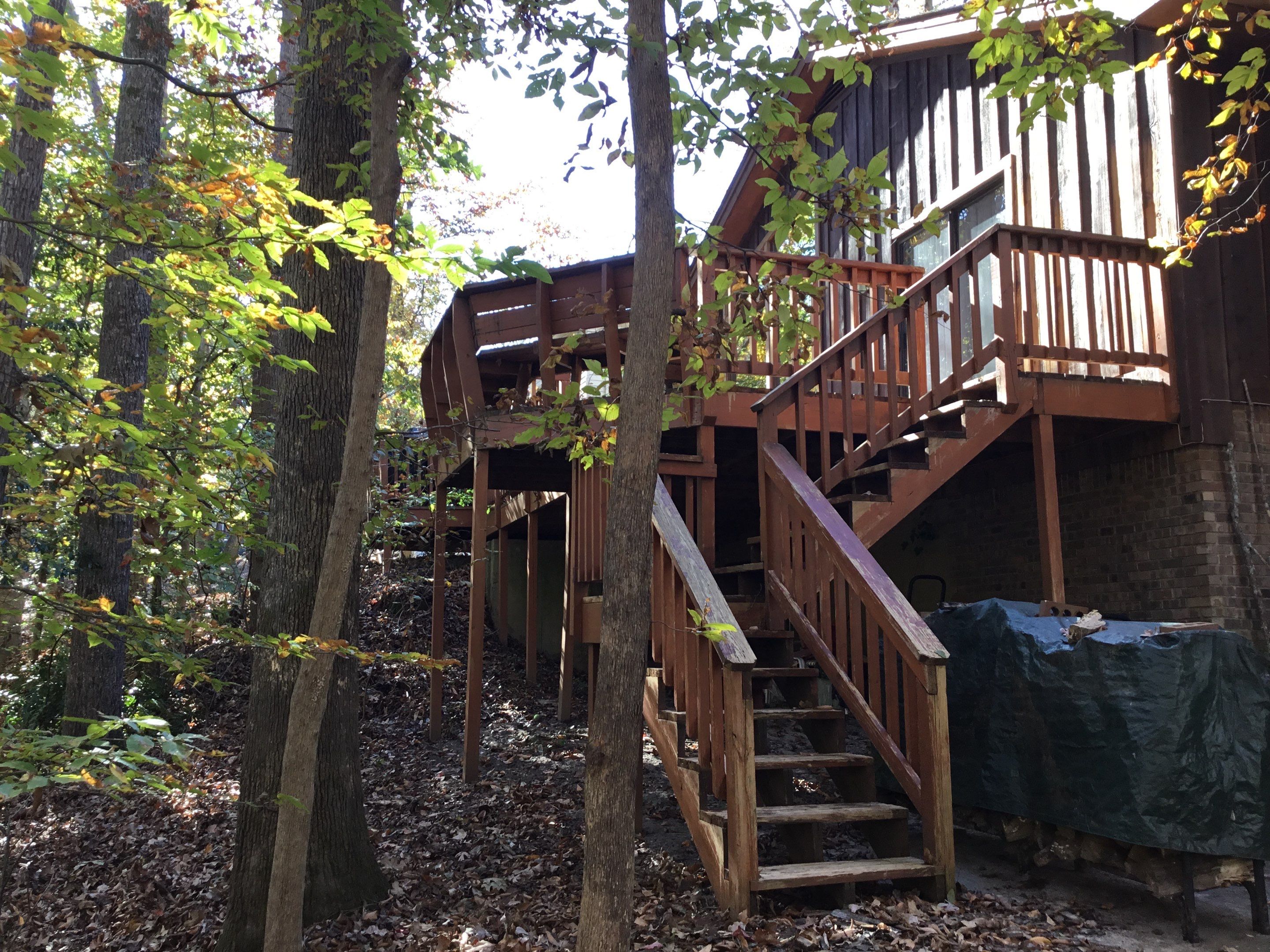 Exterior Wood Siding Painting and Gutter Refurbishment in Roswell by Swift Home Renovations