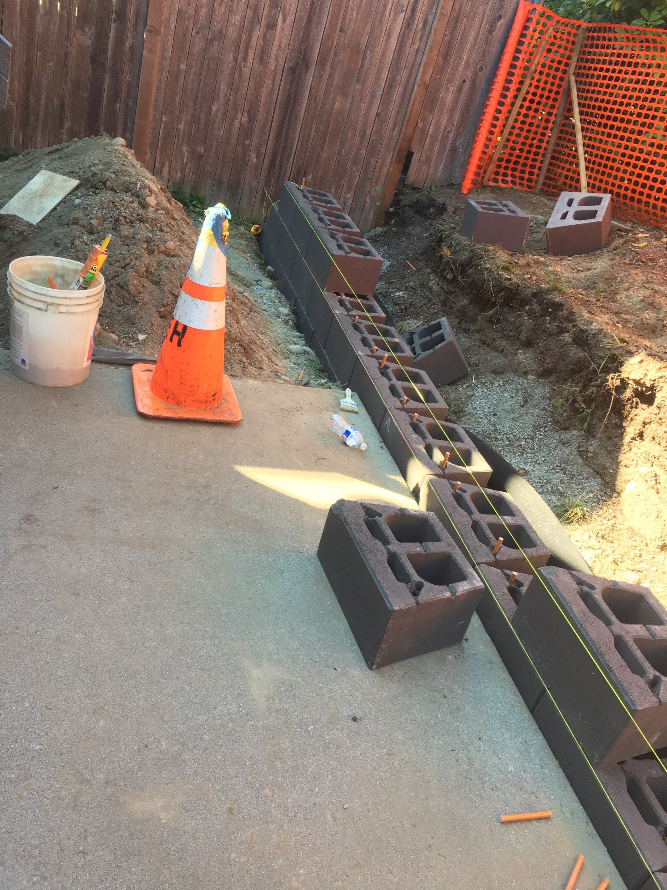 Jireh Outdoor Projects | Retaining Wall & Fence Build by Jireh Asphalt & Concrete Inc 