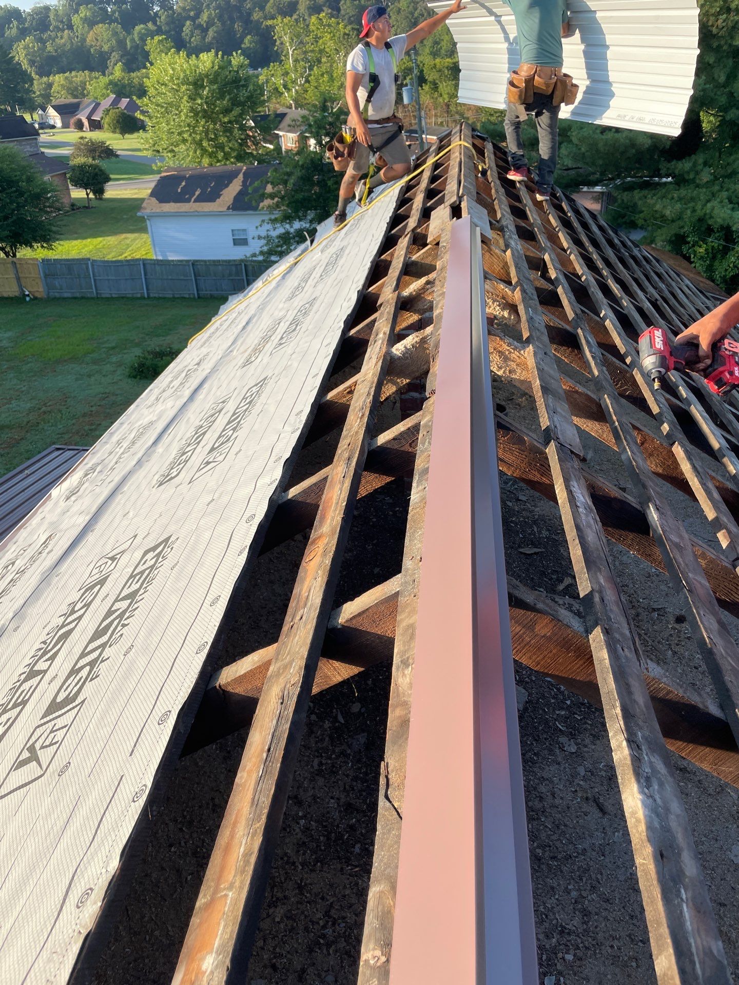 Residential Roofing Installation using Metal by Rainstoppers Roofing