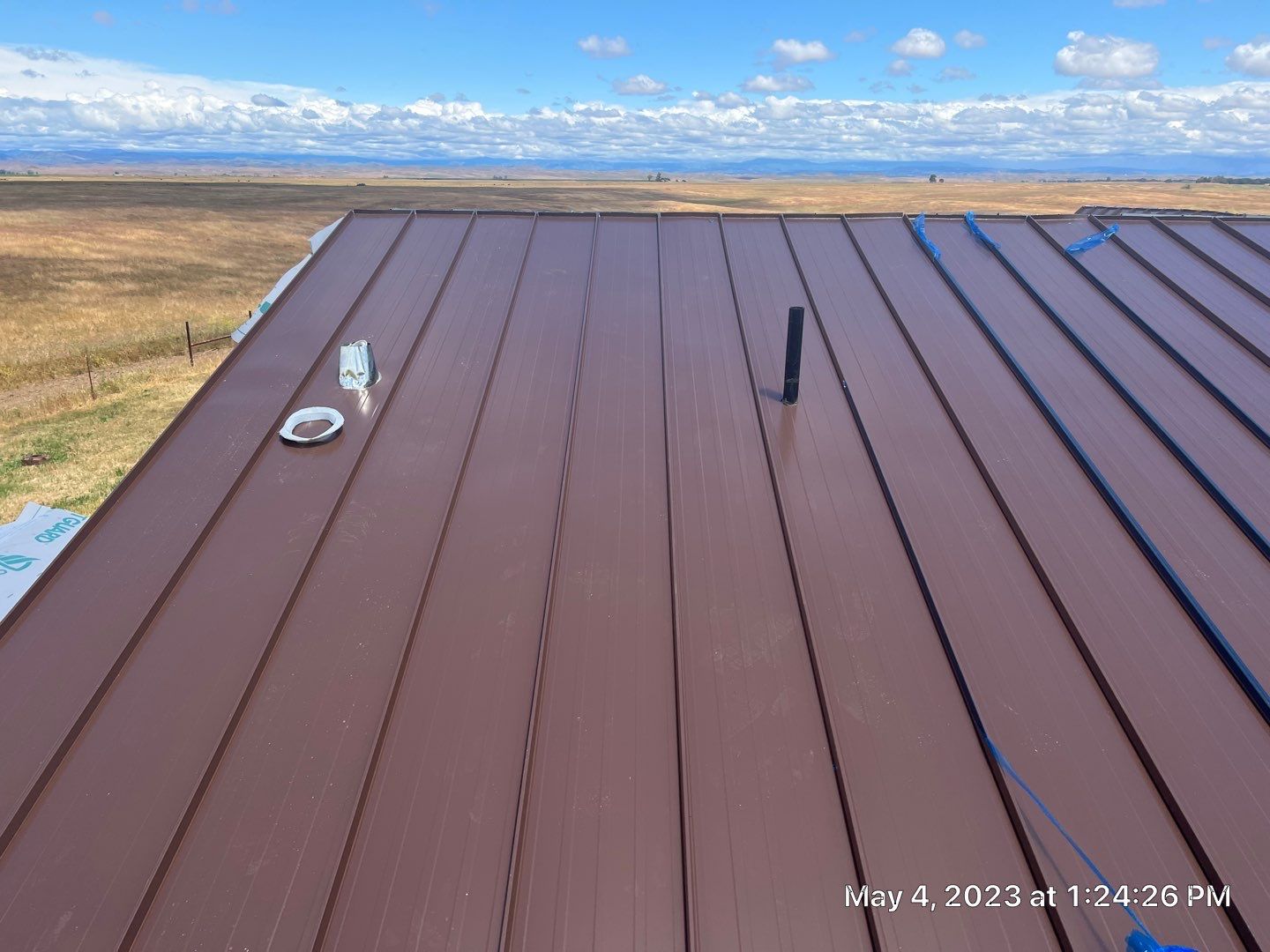 Metal roofing installation using Standing seam metal roofing system by Straight Edge Roofing Inc