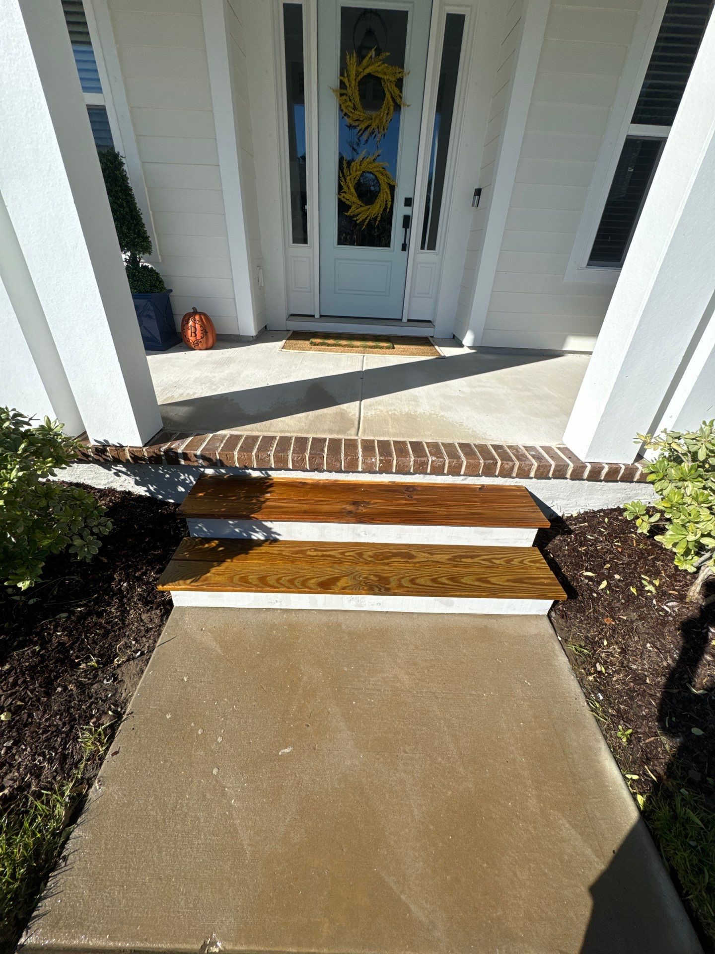 Weathered Deck and Concrete using Wood and Concrete Sealant by DuraSeal