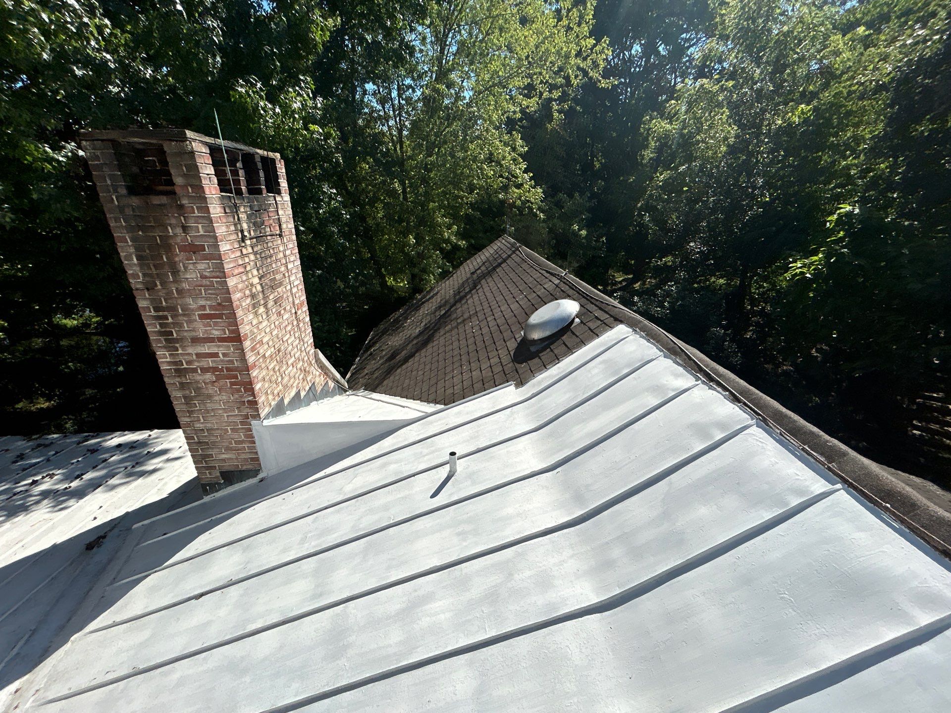 Red Metal Roofing Installation and Trim Restoration in Bernville by Esh Builders