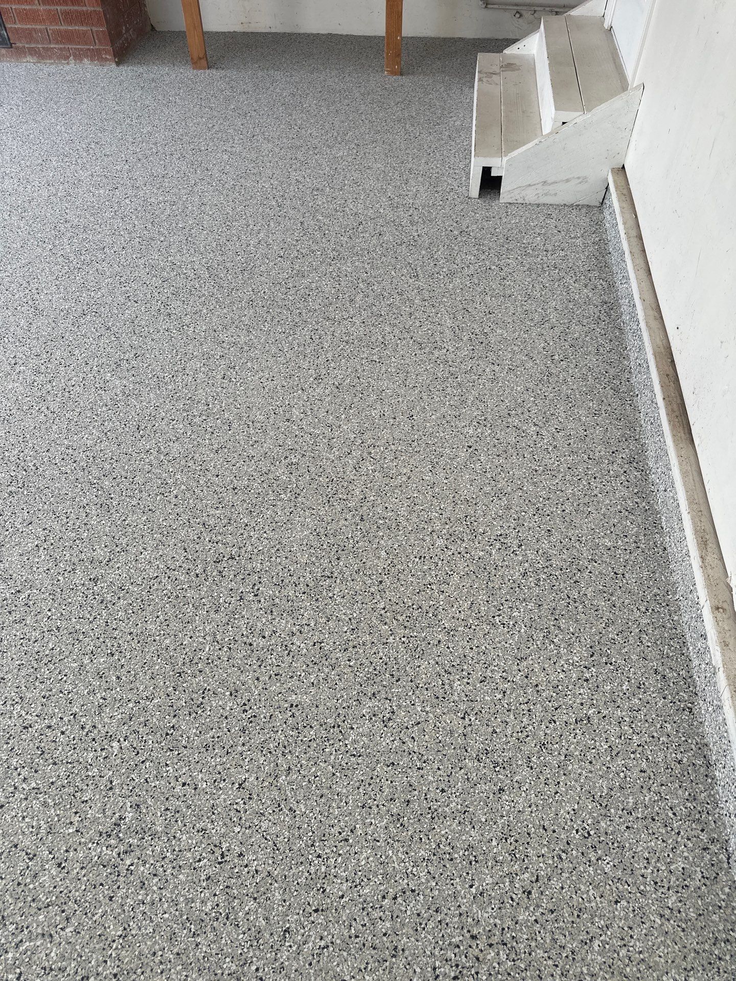 Polyurea Garage Floor Coating with Cabin Fever Decorative Chips in Cambria by MGP Coatings