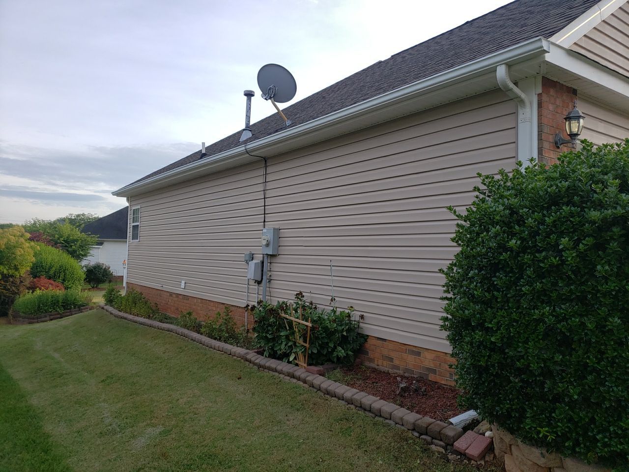 House Wash using cleaner by Power Wash Masters LLC