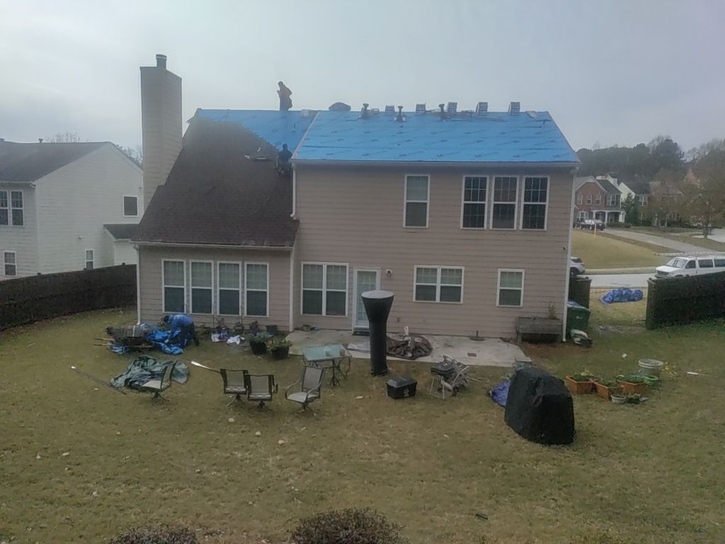 Residential Roofing Installation using Timberline HDZ Hickory  by Inspector Roofing and Restoration