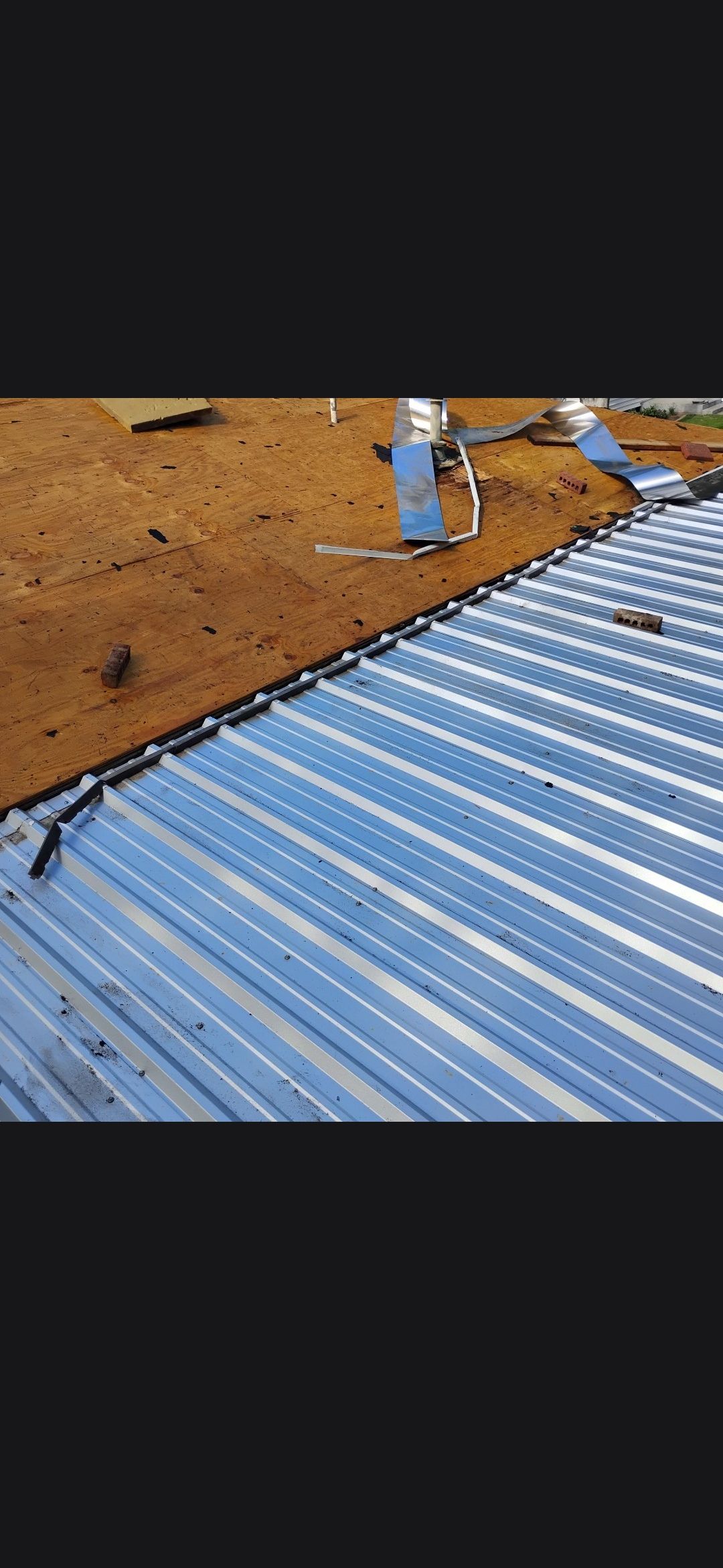 Reroof with Panels by Berry Good Roofing