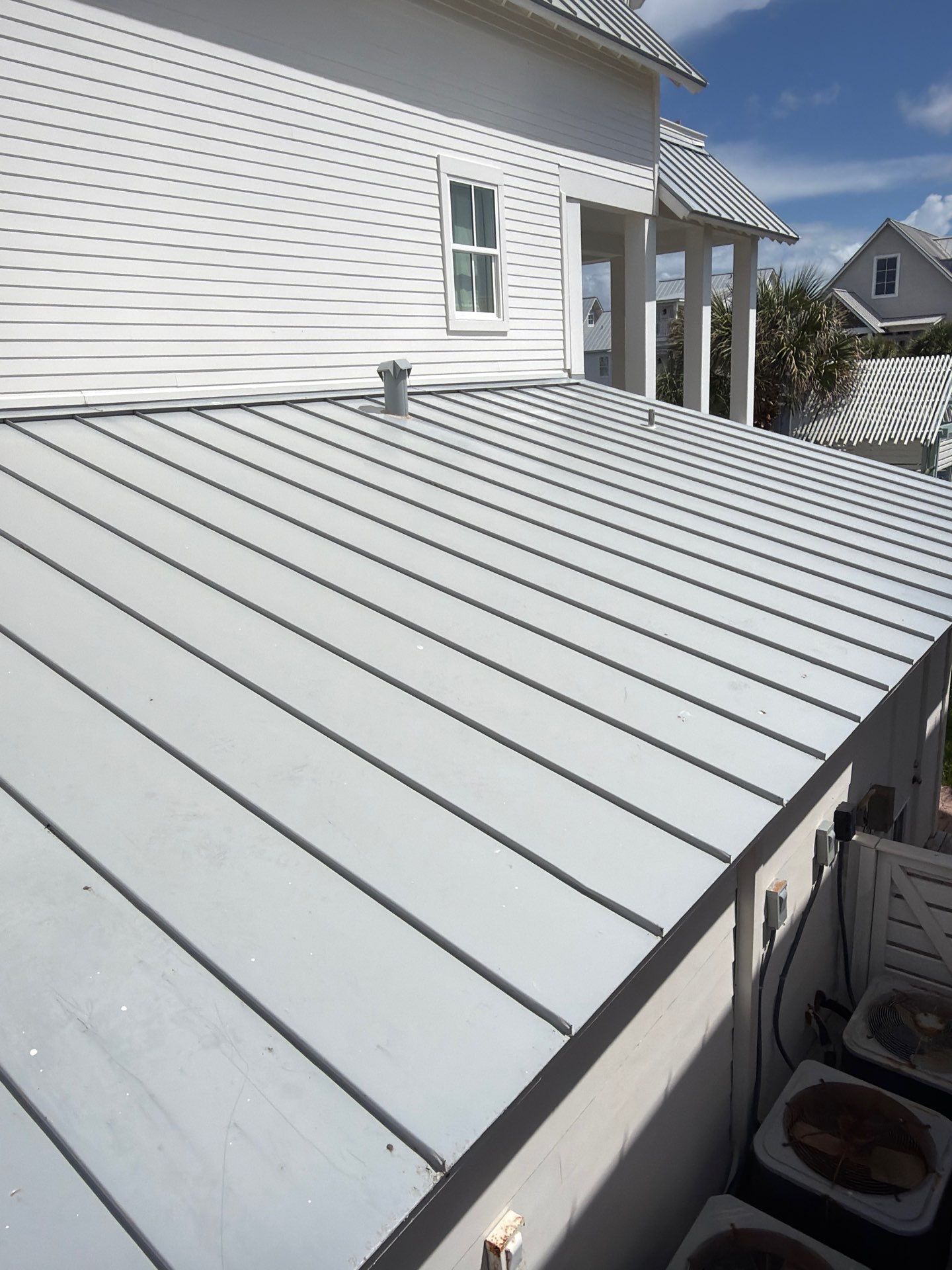 Residential Roof Replacement using .032 Standing Seam Doublelock - Aluminum by Action Exteriors Austin