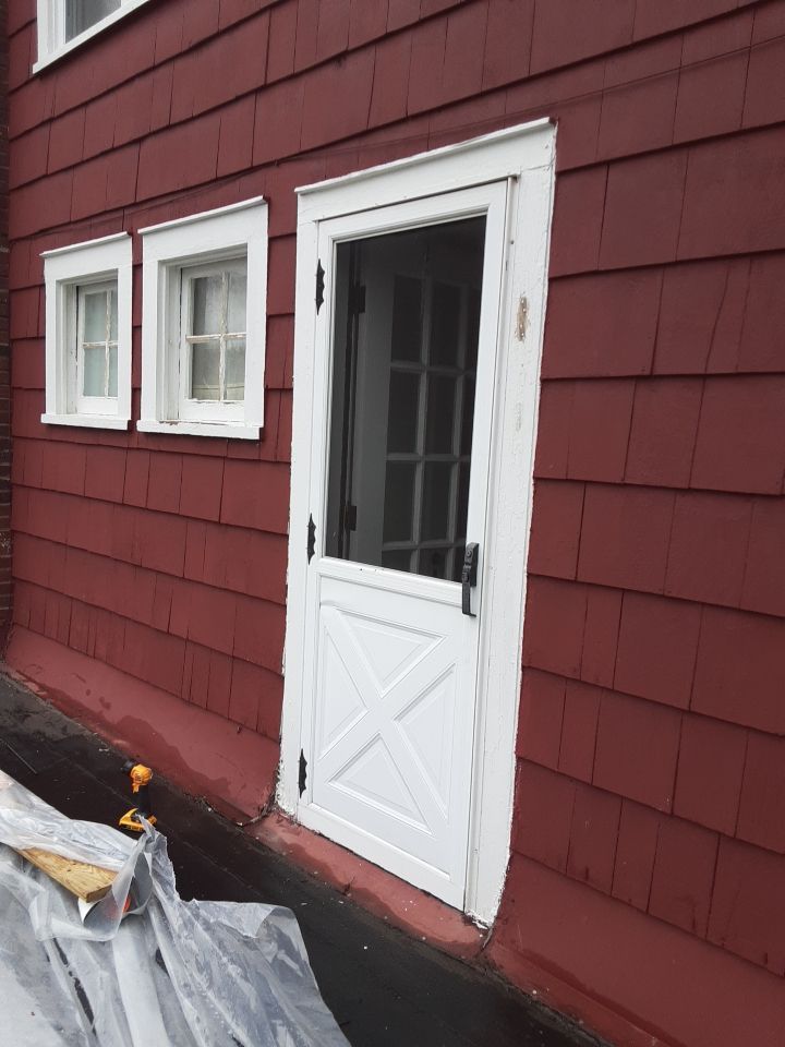 Residential Roof Replacement using Patio Roof by Absolute Roofing and Construction