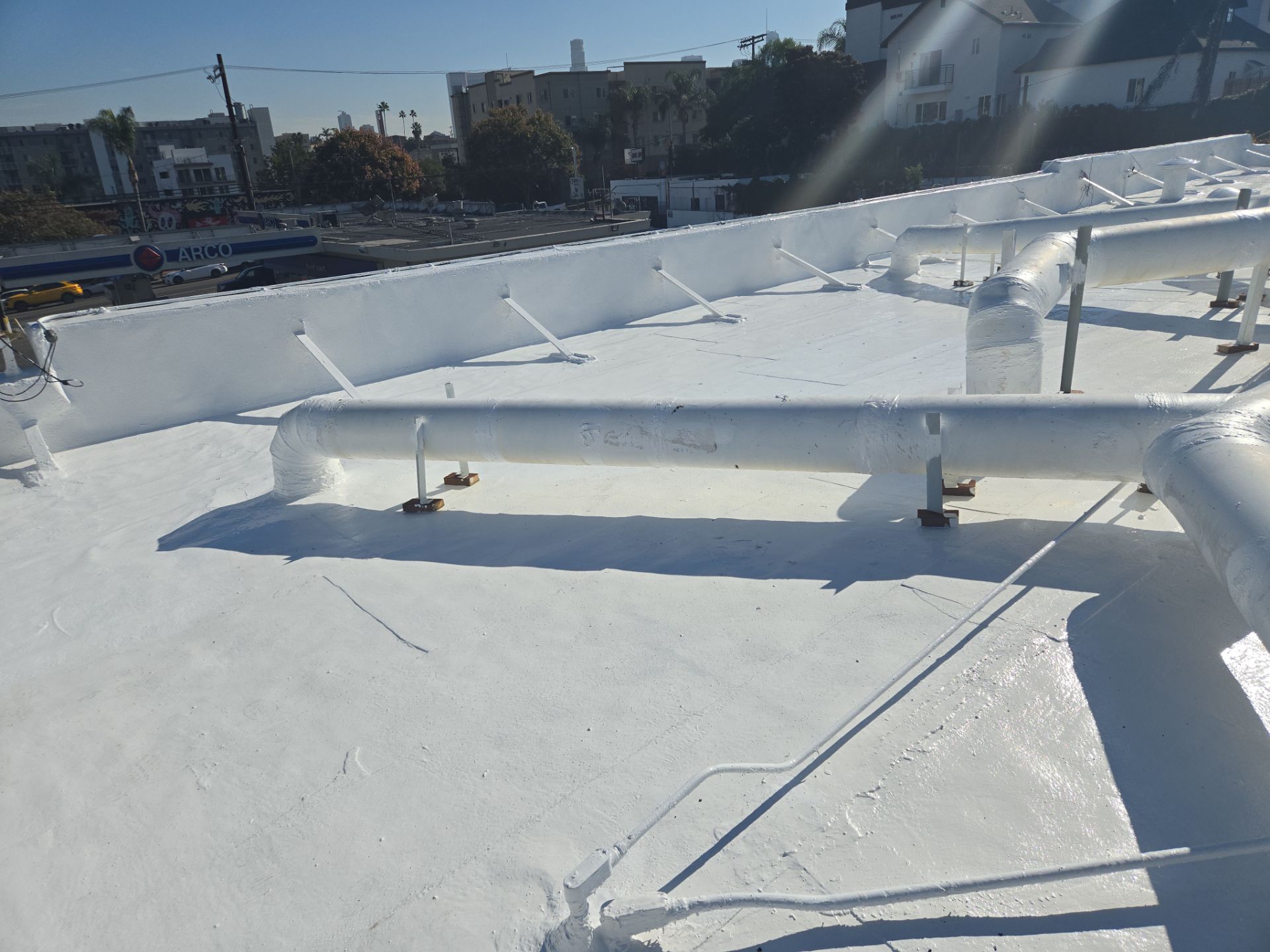Commercial Roofing Installation using ASC Silicone Membrane by Hull Brothers Roofing
