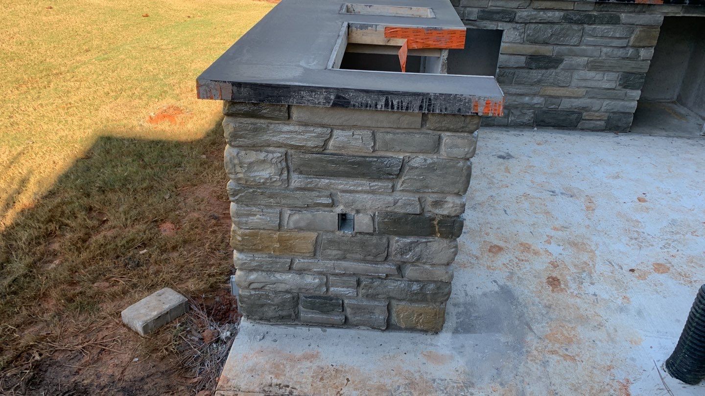 Outdoor Kitchen on Lake Keowee by Xtreme Concrete Services
