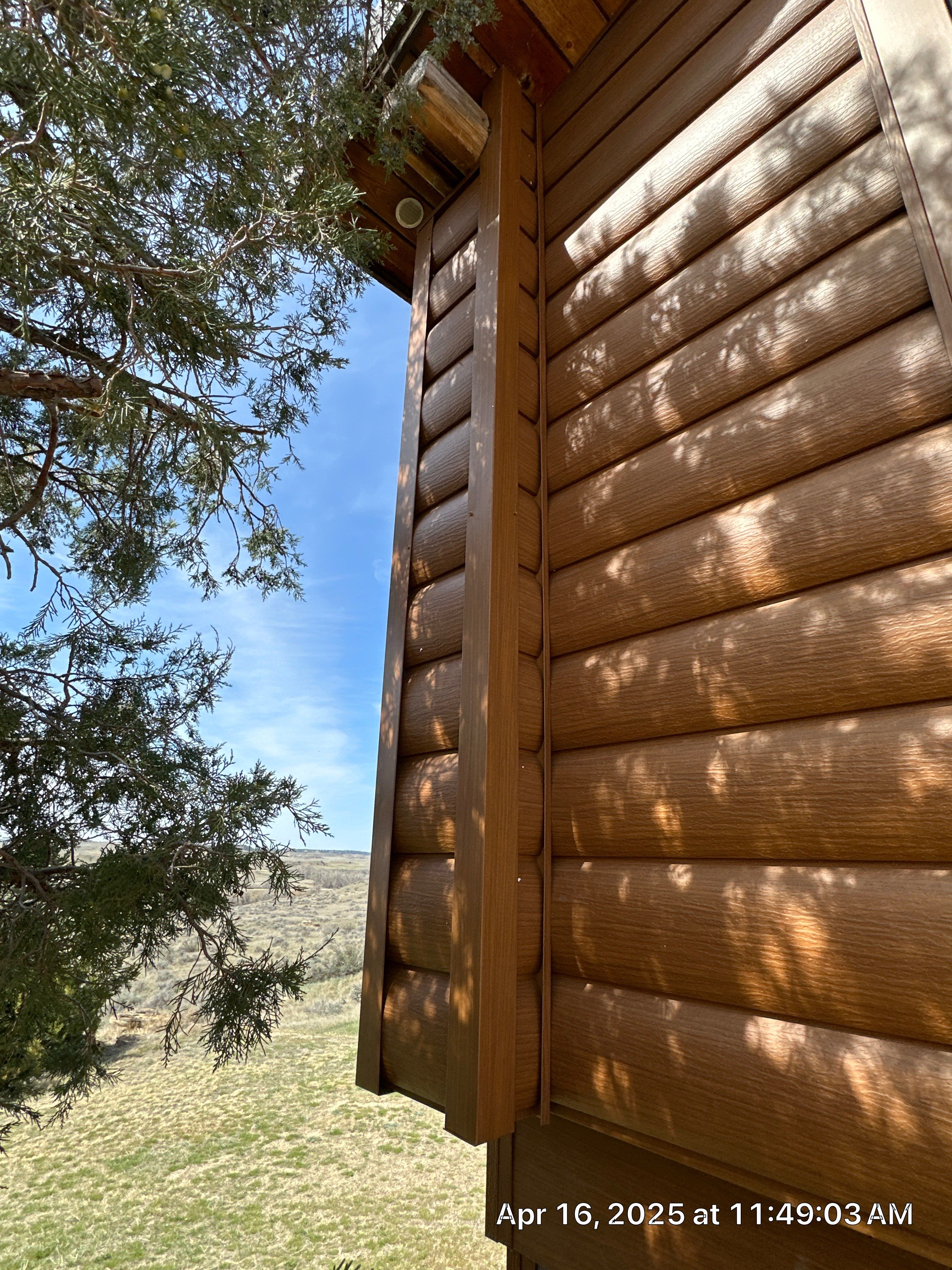 Siding Installation using Log Siding by Lynnrich Seamless Siding, Windows & Doors