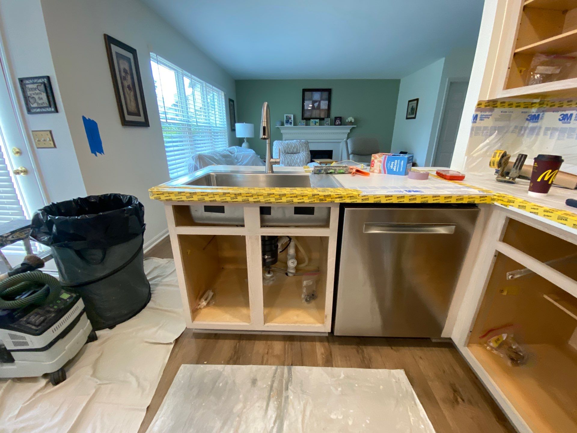 White Shaker Cabinet Installation and Quartz Countertop Replacement in Rochester by Top Shelf Painter