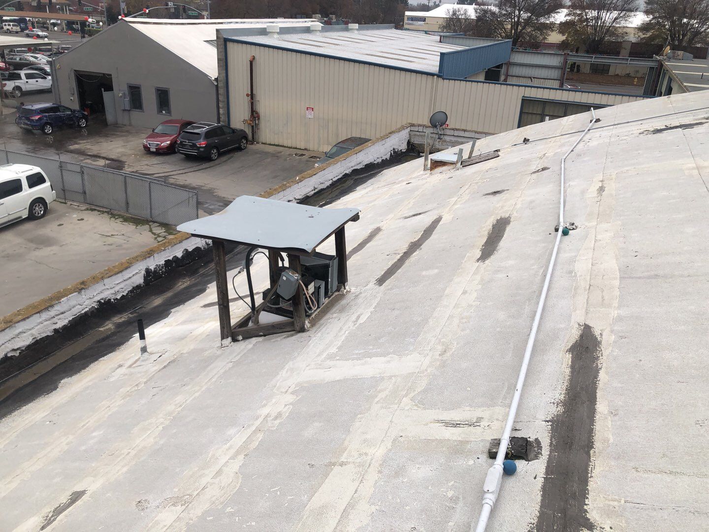 Spray foam and coatings using Conklin Benchmark/PUMA XL coatings and spray foam by Straight Edge Roofing Inc