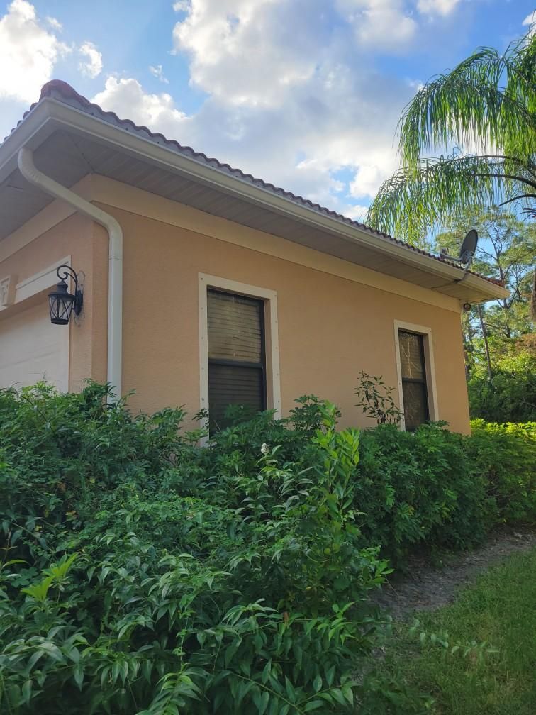 New Splash Guards and 6-Inch seamless Gutters in Naples FL by Gutter Professors