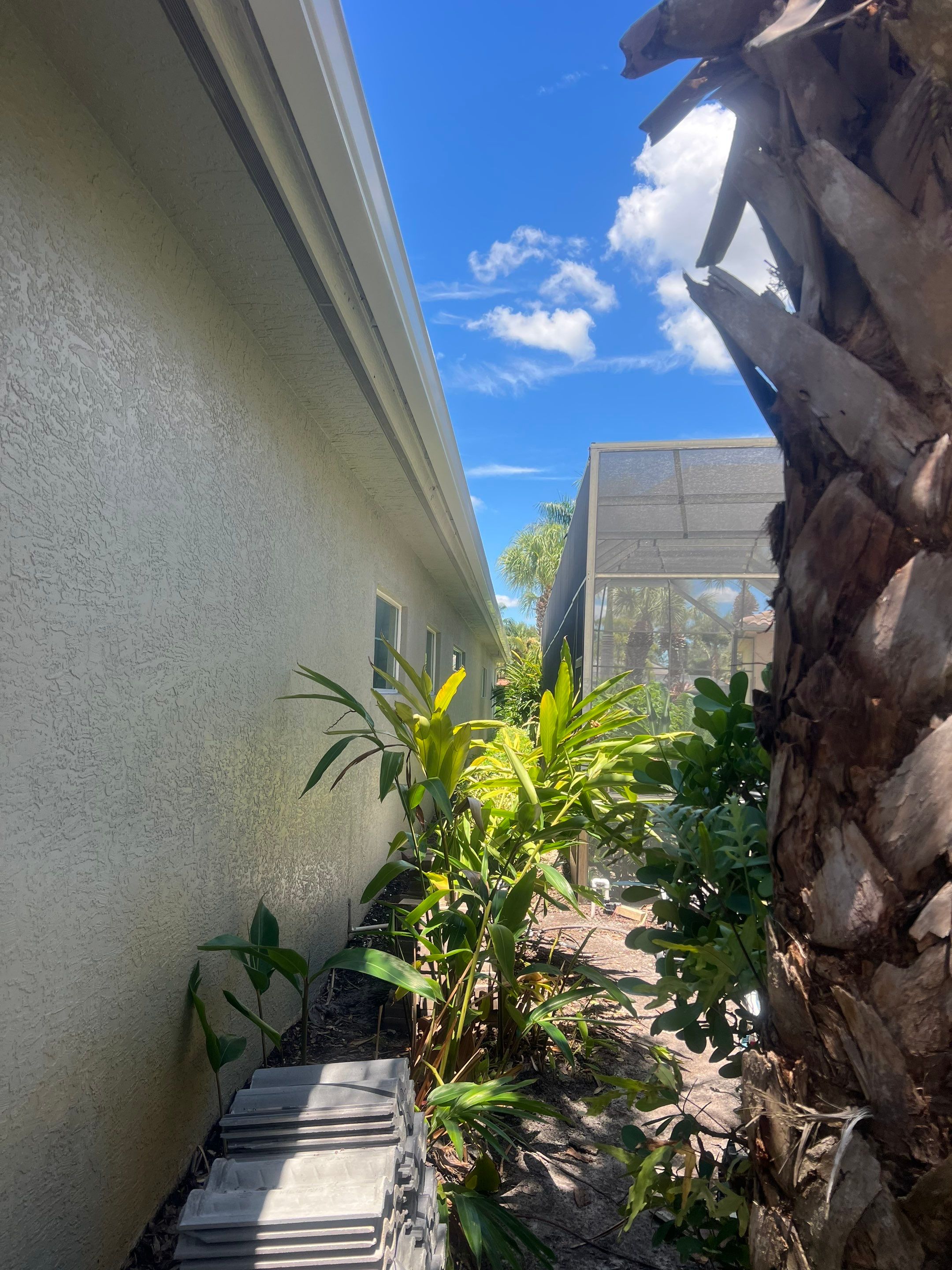 6 Inch Seamless Gutters and Downspout Installation in Naples FL by Gutter Professors