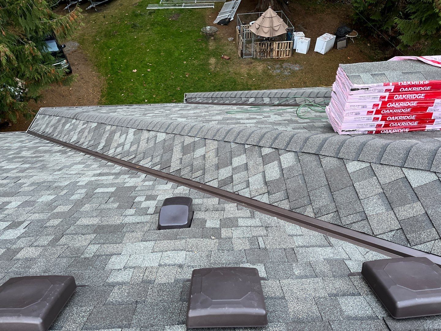 Residential Roofing Installation using OC Oakridge shingles by Top Notch Roofing Inc