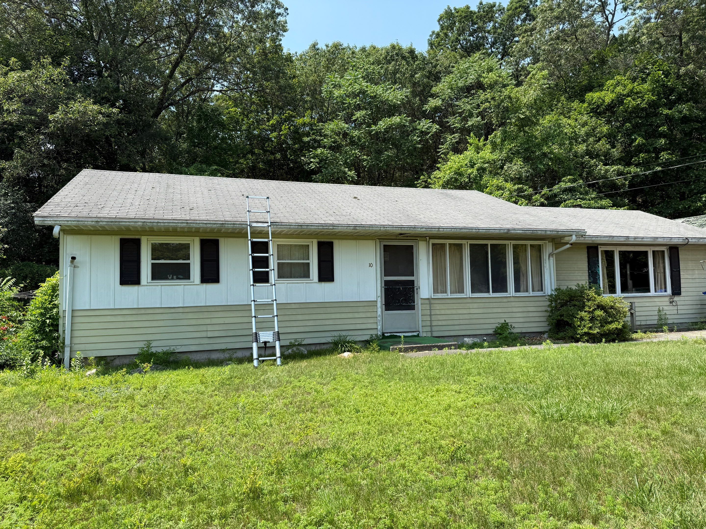 Onyx Black Roof Transformation in Maynard, MA by Mighty Dog Roofing of Greater Middlesex County