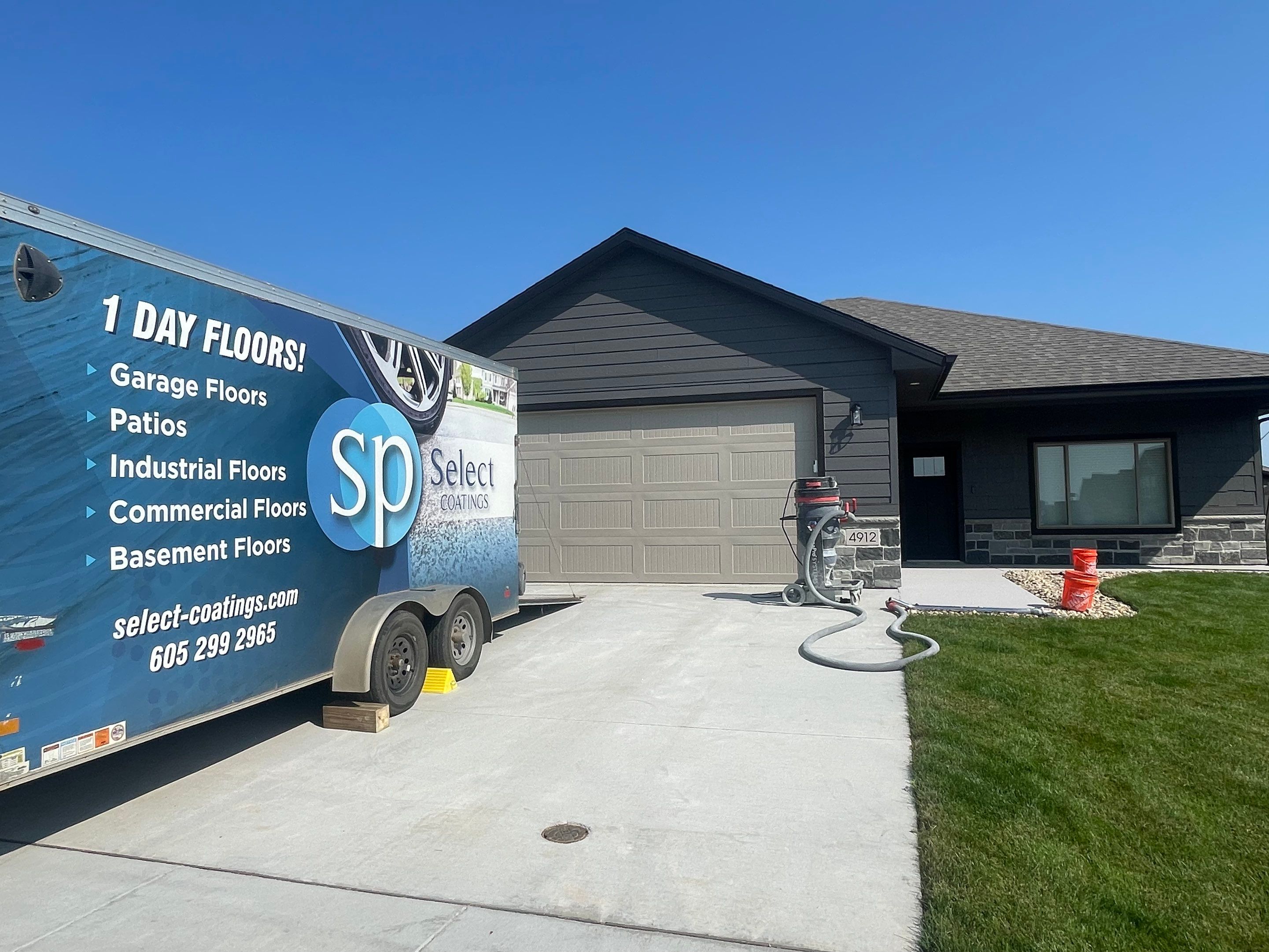 Sioux Falls Residential Concrete Patio and Walkway Coating by Select Painting, Coatings & Garage Cabinets