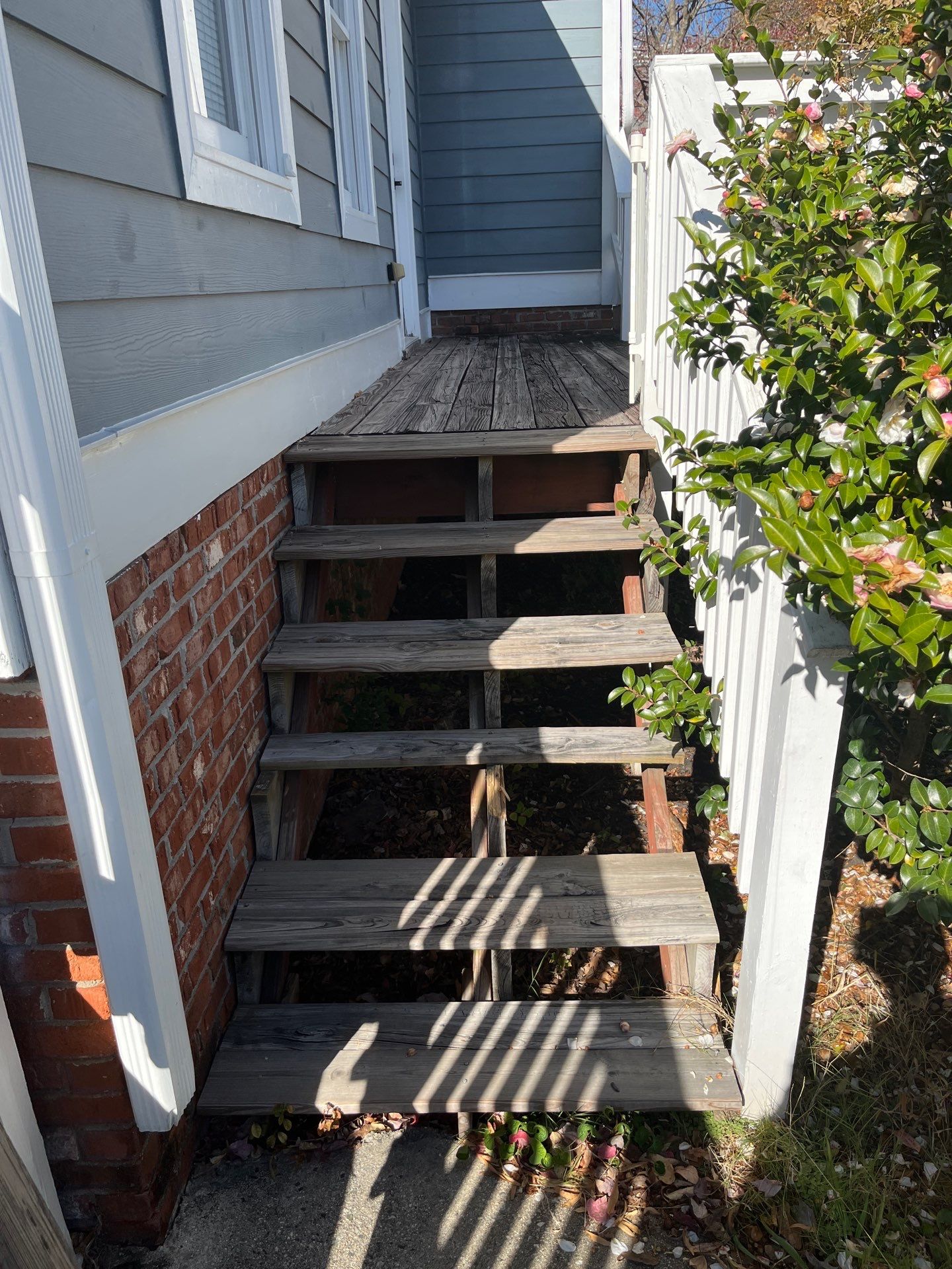 Atlanta, GA Deck Rebuild and Pergola Build using Deckorators Venture Series Decking, Trex Composite Railing, and Pressure Treated Pine by Nelson Exteriors 