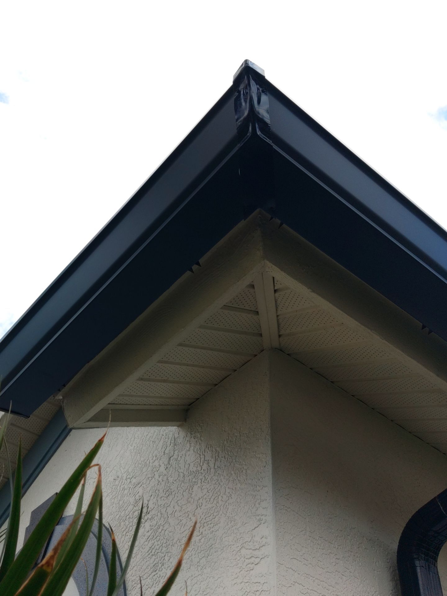Black Seamless Gutters  by Gutter Professors