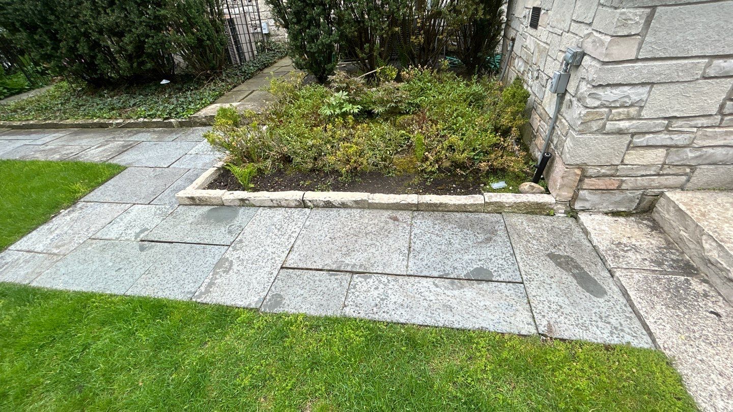 Winnetka, IL bluestone patio cleaning by Northern Power Washing LLC.