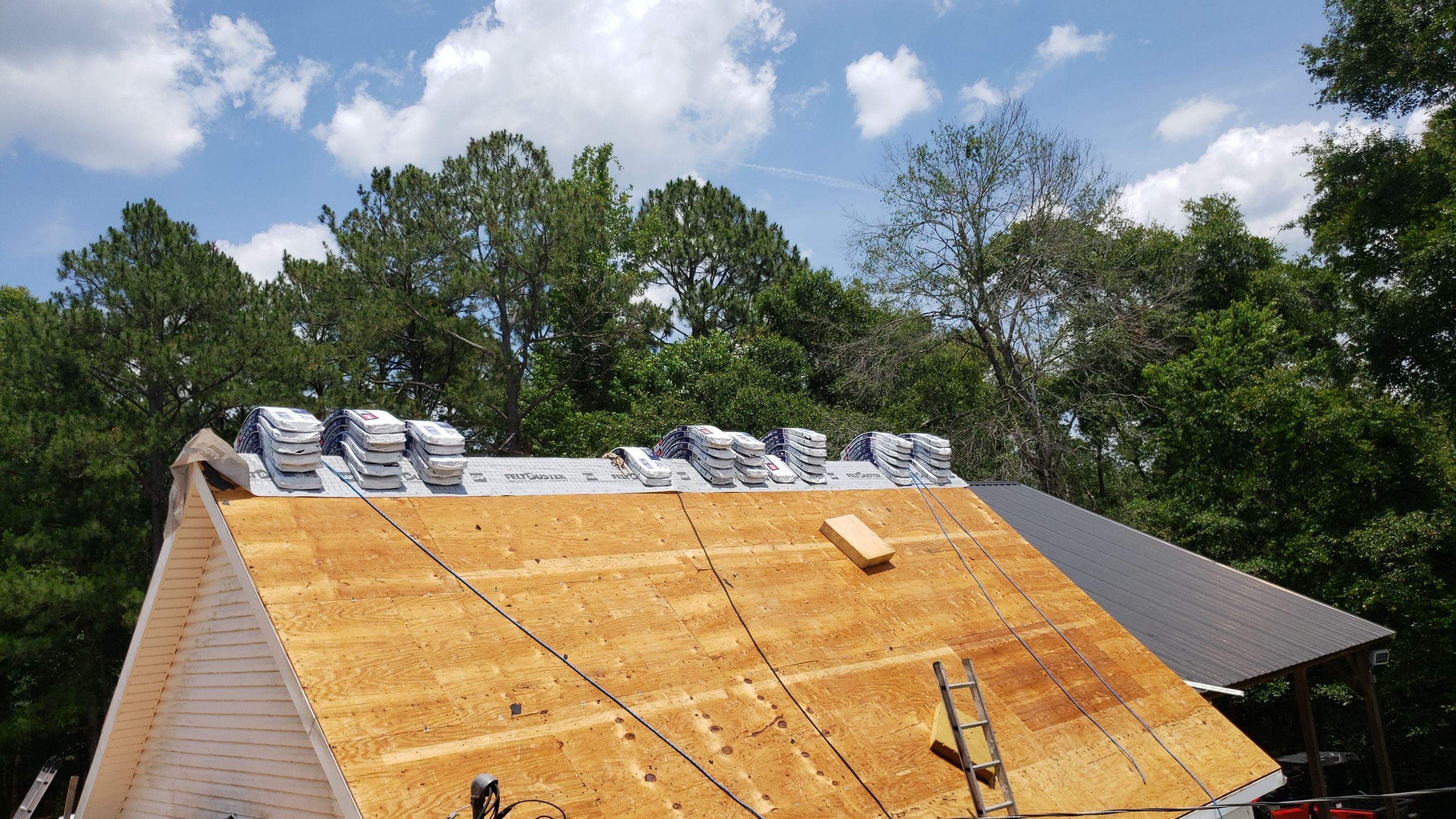 Residential Roofing Installation using Roof Replacement by American Roofing & Construction LLC