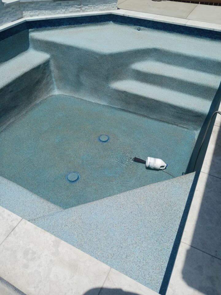 Geometric Pool with Raised Spa and Tanning Ledge by Pinnacle Pools and Spas - DFW