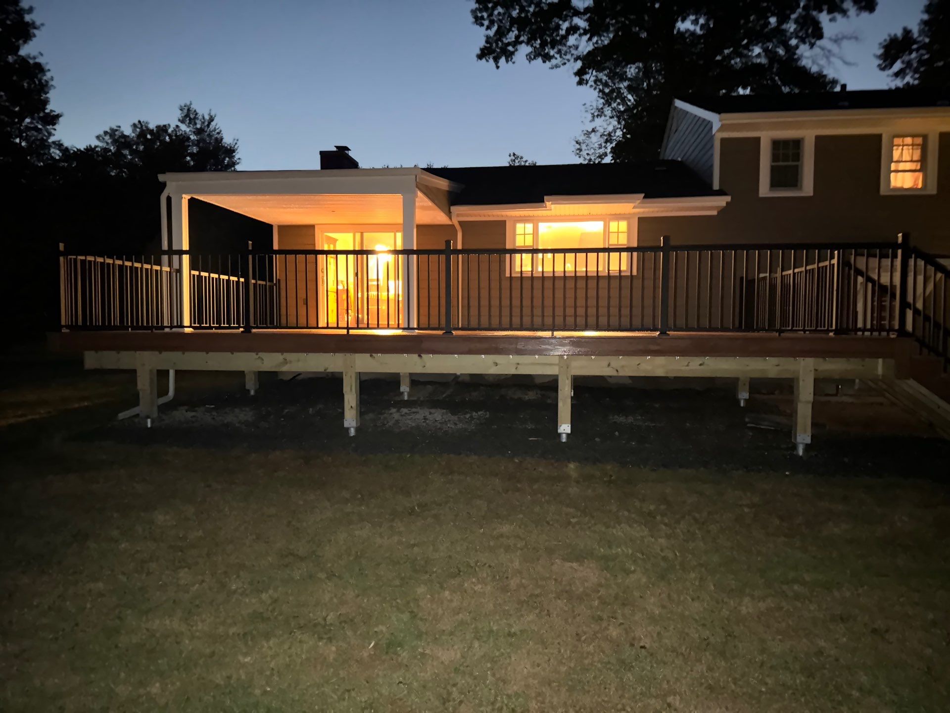 New Deck using Trex Tiki Torch  by deck guardian