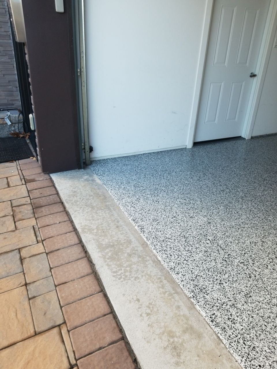 Garage Floor Coating in Penntek Domino by Spectrum Painting, LLC