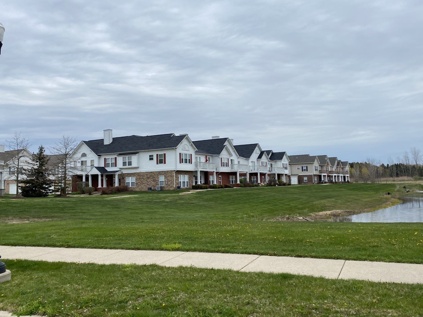 Multi Family Large Scale Roof Replacement by Bloomfield Construction & Restoration