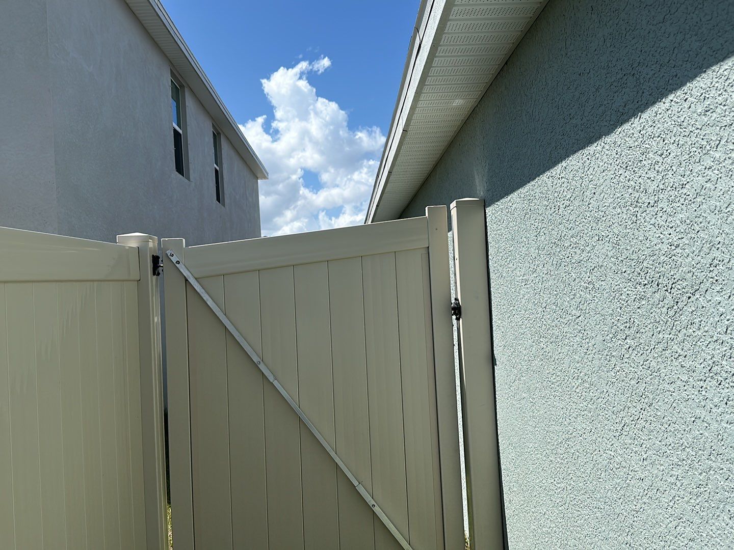 Vinyl Fence Installation using Tan Vinyl Privacy Fence by Asap fence and gates, LLC