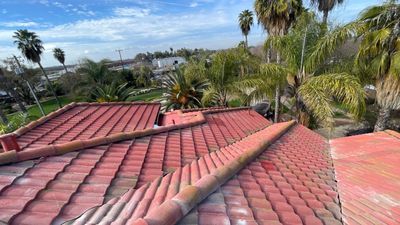 Tile refurbish project using existing tiles and replaced underlayment and battens