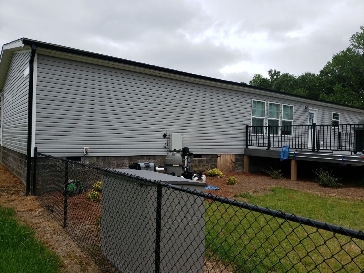 House Wash using cleaner by Power Wash Masters LLC