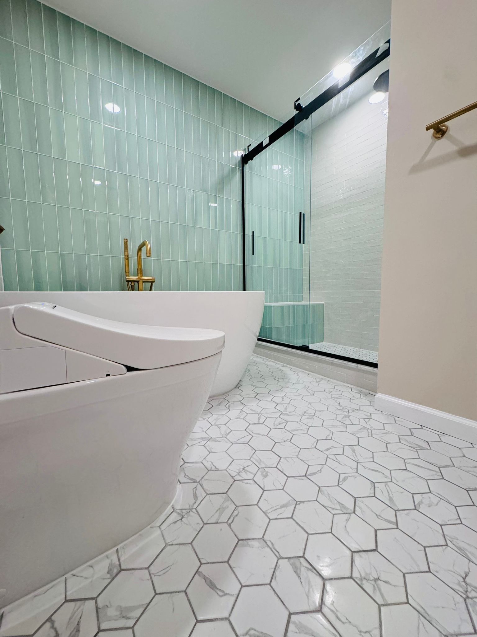 Bathroom Remodel using Tile by Home Concepts Construction