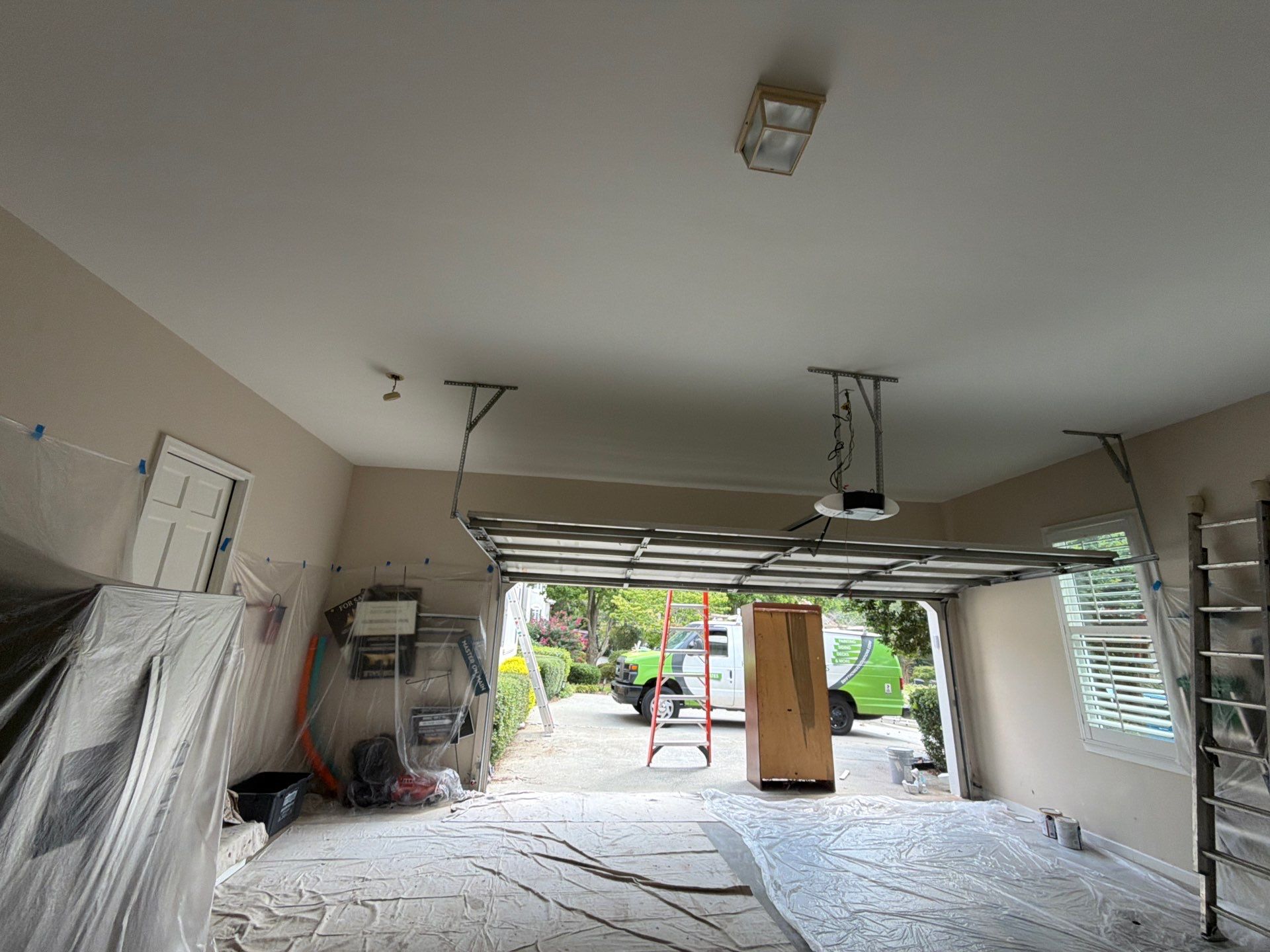 Multi-Story Stucco Home Exterior Painting and Garage Refresh in Marietta by Swift Home Renovations 