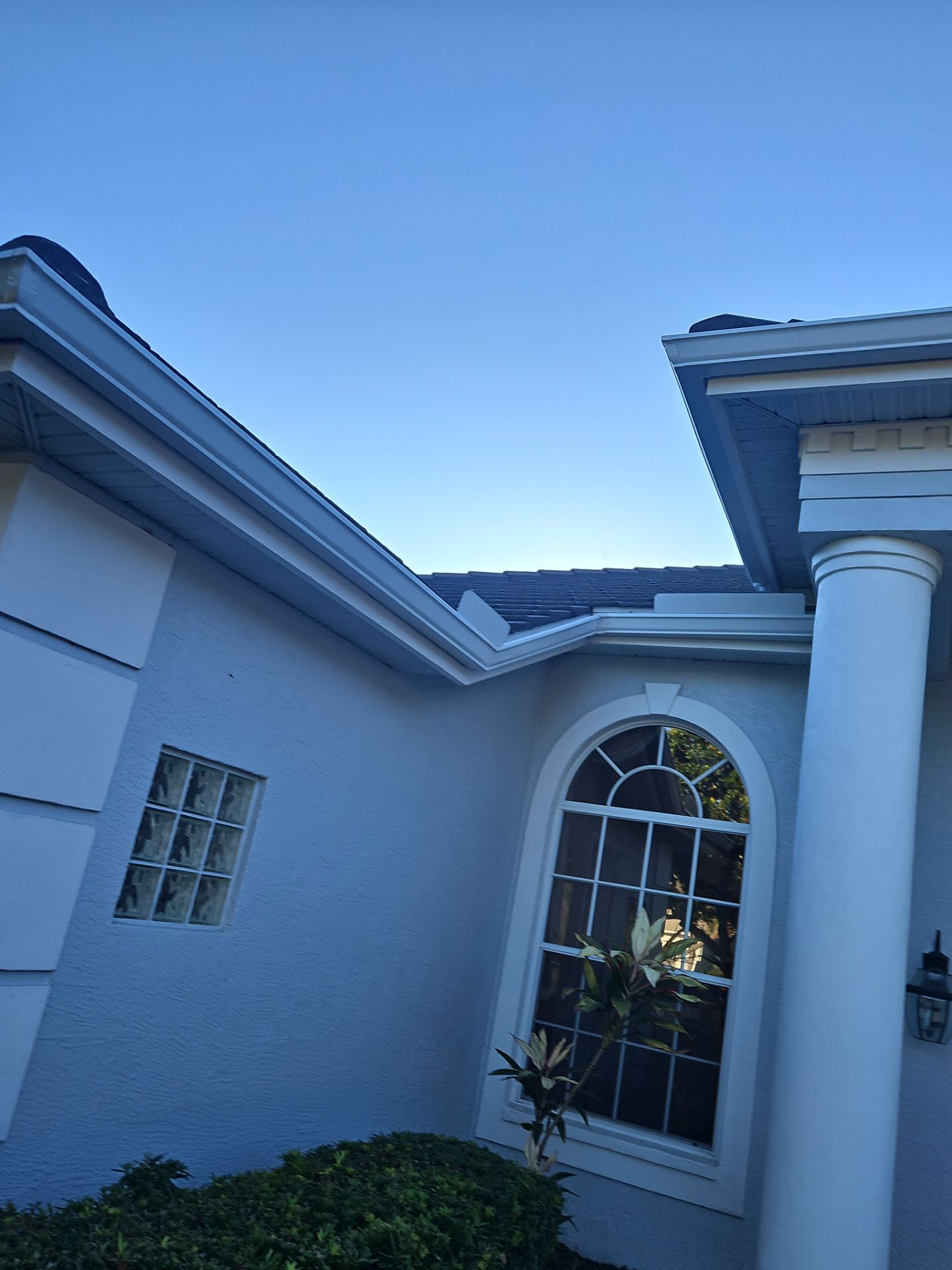 White Down Spouts using downspouts and White Seamless Gutters in Sarasota FL by Gutter Professors