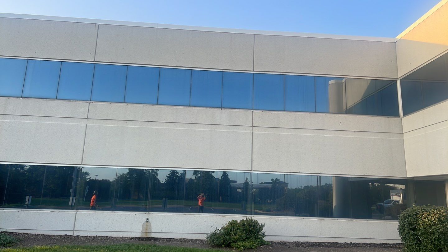 commercial pressure washing using Algaecide, soft wash soap by Northern Power Washing LLC.
