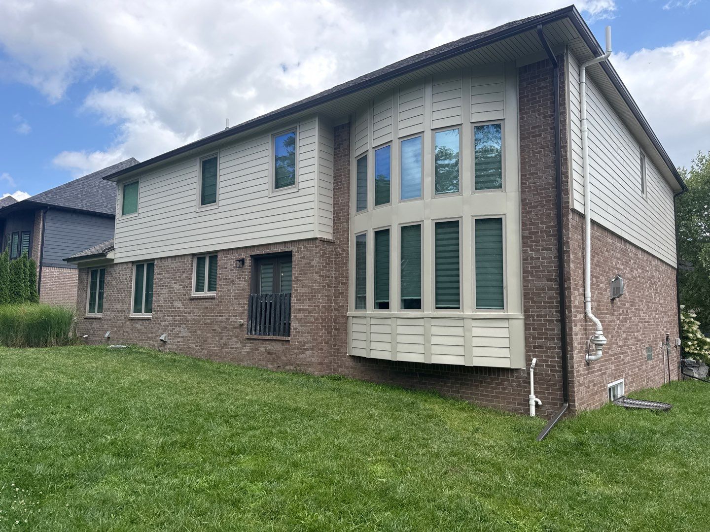 Siding Replacement using Alside S7 Cedar Mill Grain Composite by 180 Contractors