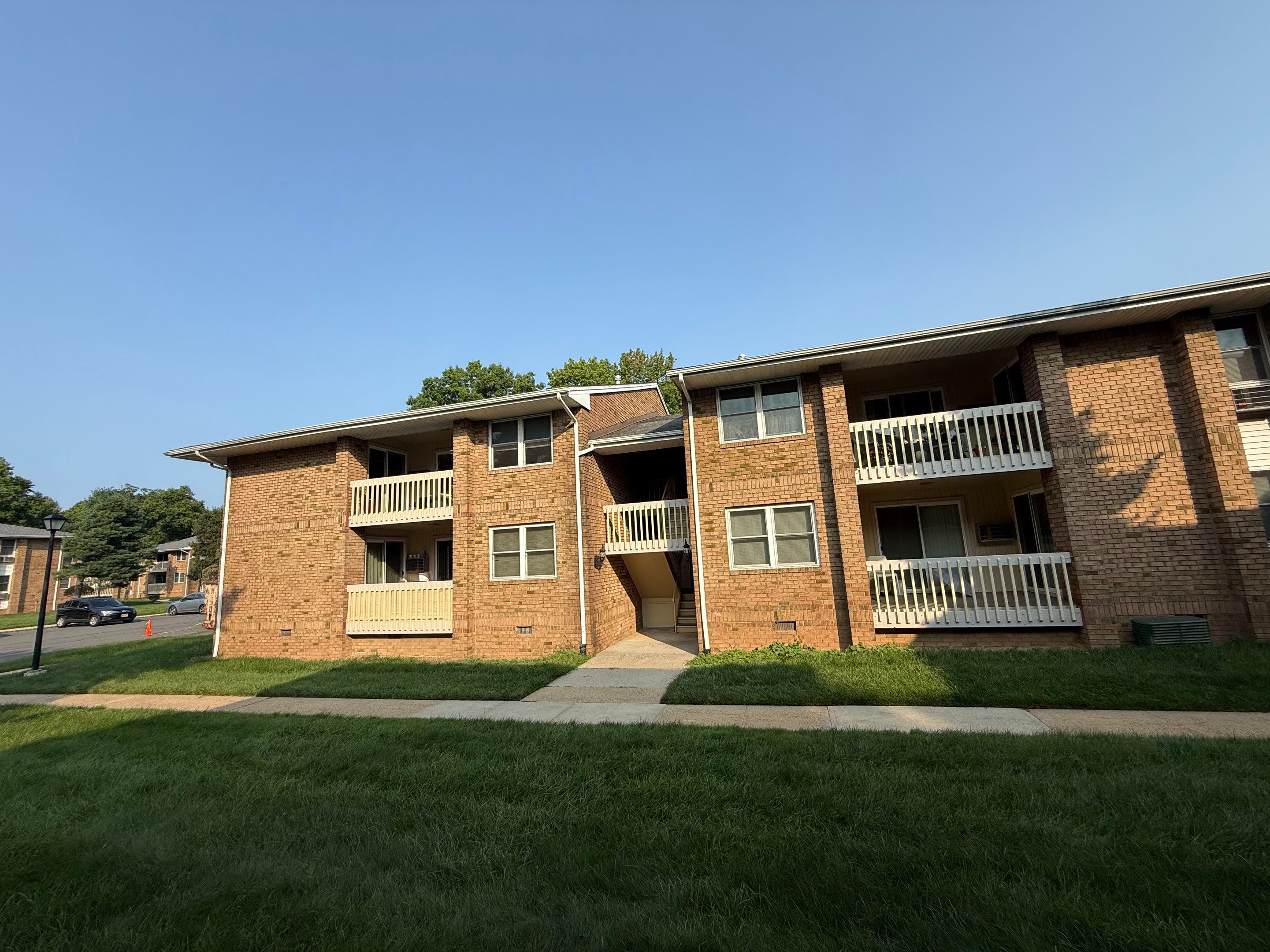 Apartment Complex Roof Replacement and Decking Repair in North Brunswick by JVW ROOFING