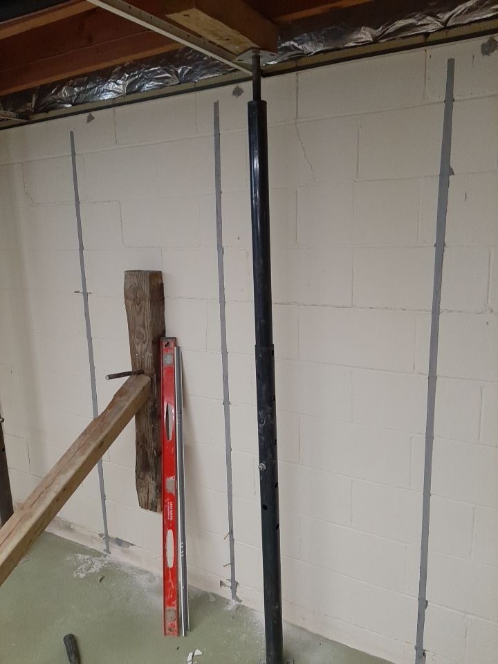 Wall Straightening and Reinforcement using Embedded Fiber Reinforcement by Toledo Basement Repair 