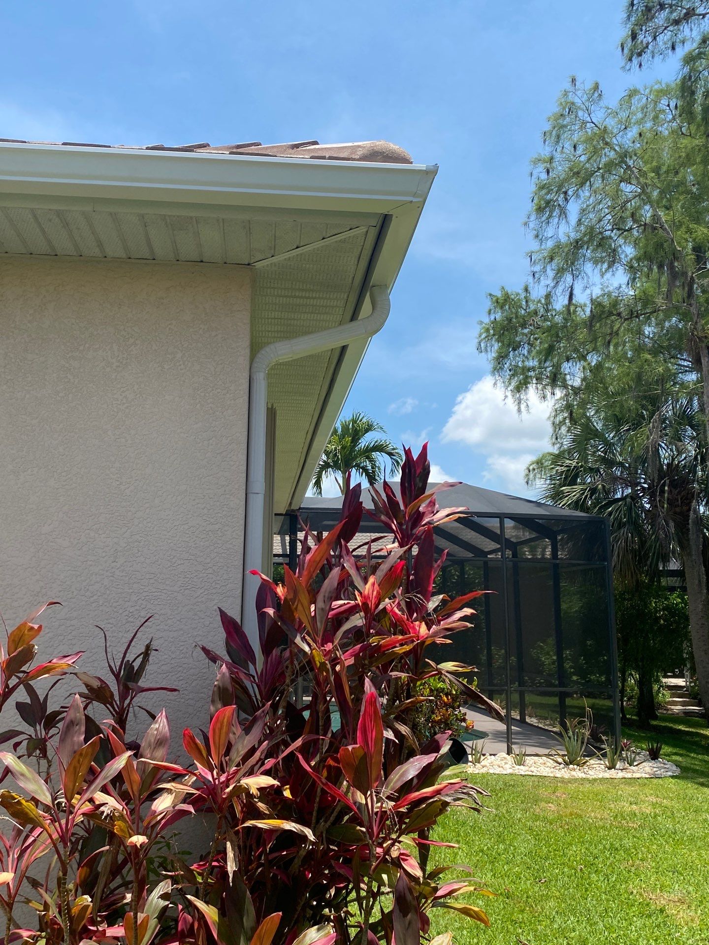 Seamless Gutter Upgrade Before & After in Bonita Springs FL by Gutter Professors