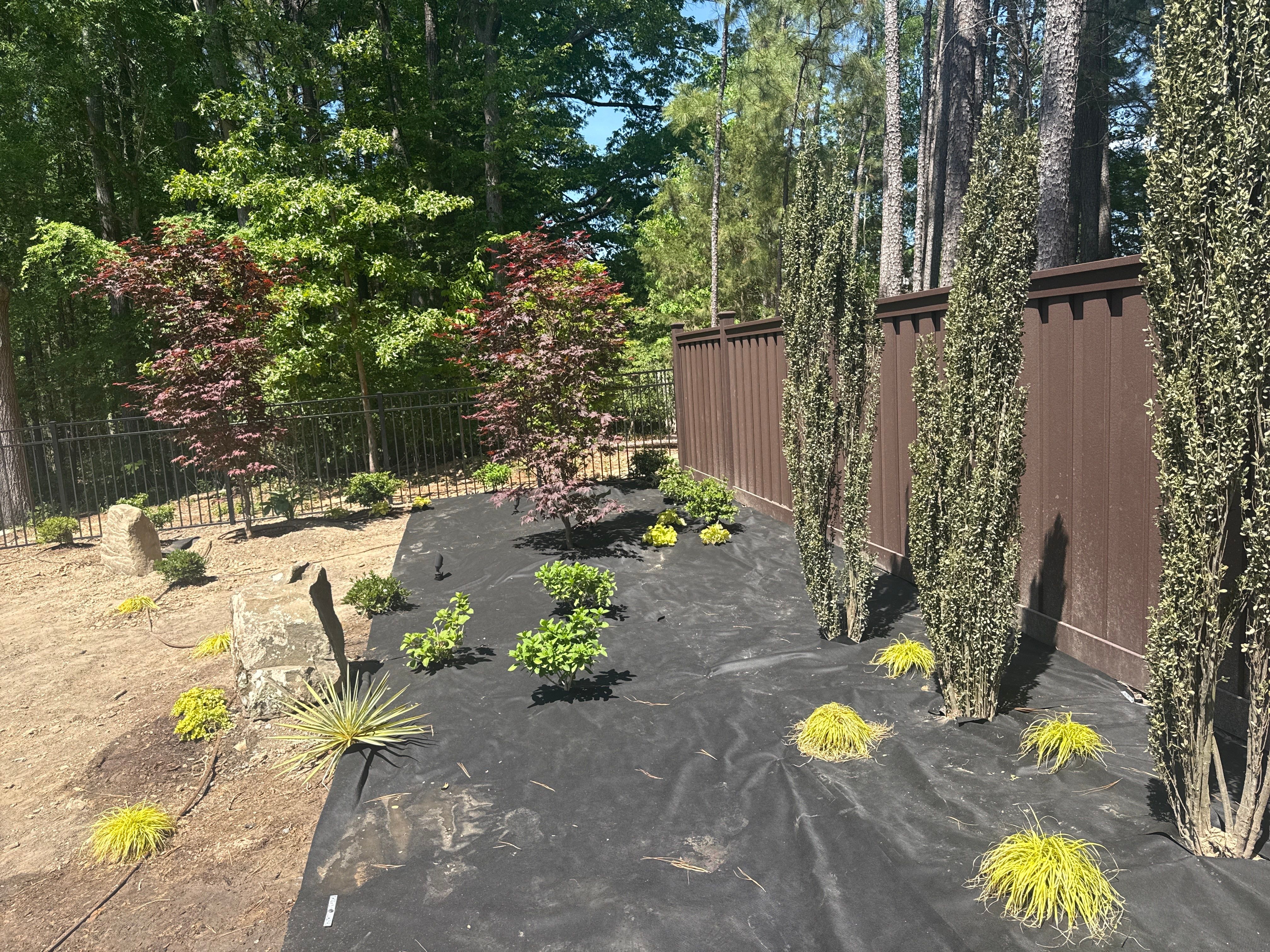 Backyard oasis in Cary by Martinez Brother’s Nc Landscaping Inc