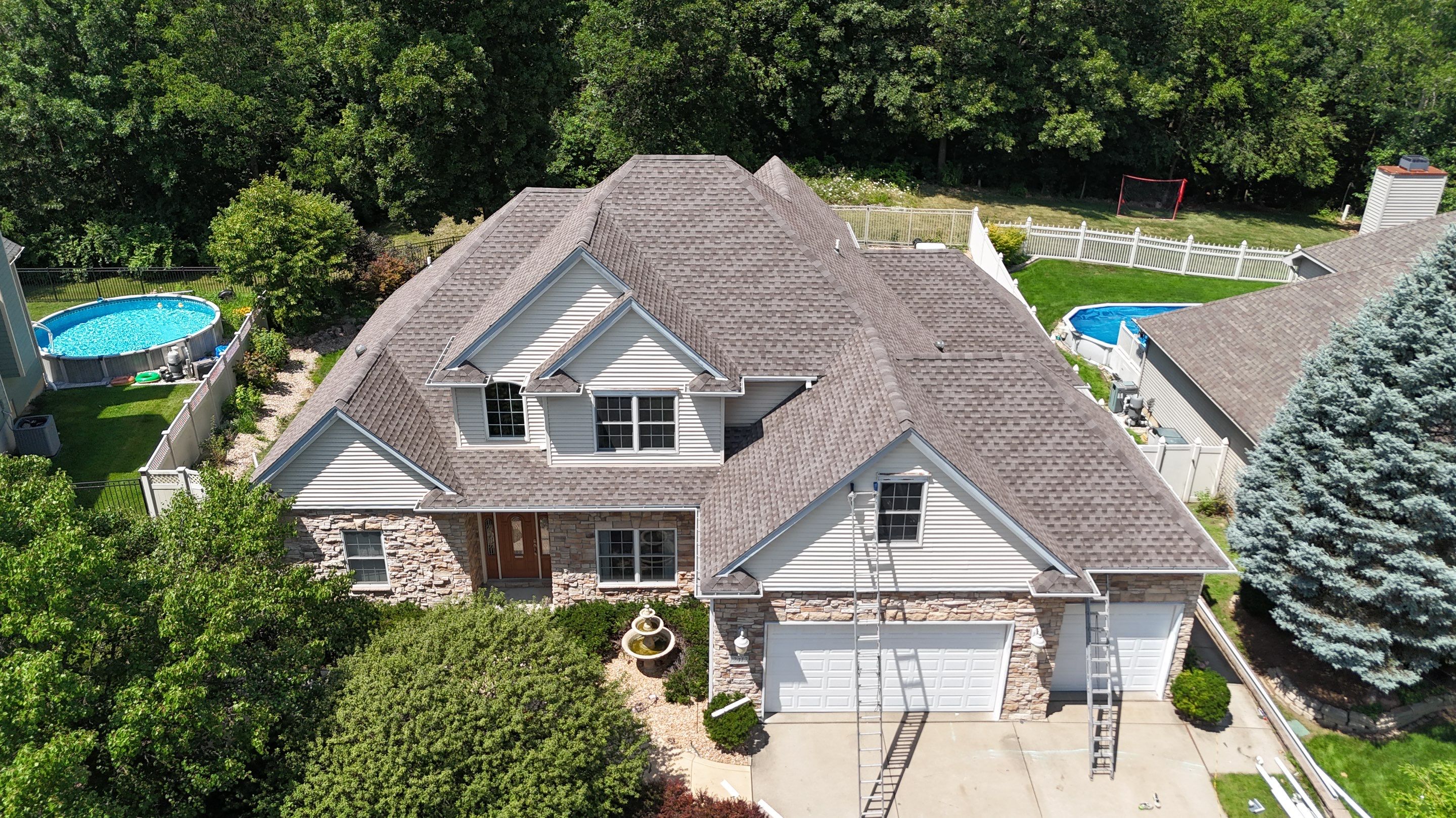 Roofing using GAF Weathered Wood by Optimal Home Improvement 