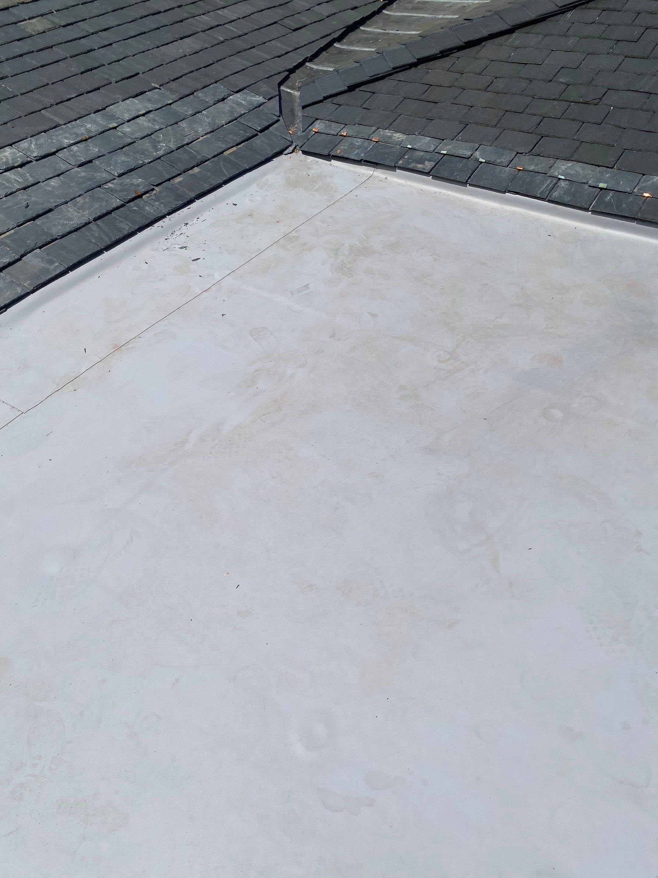 Arlington: Buckingham Slate and Carlisle Syntec TPO Roof by RM Banning, Inc.